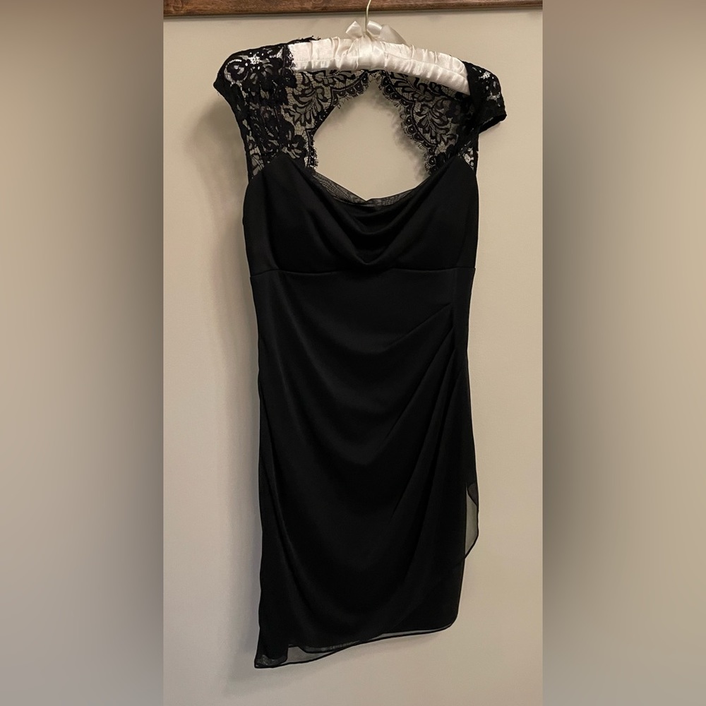 Women’s size 8 little black dress with lace cap sleeves